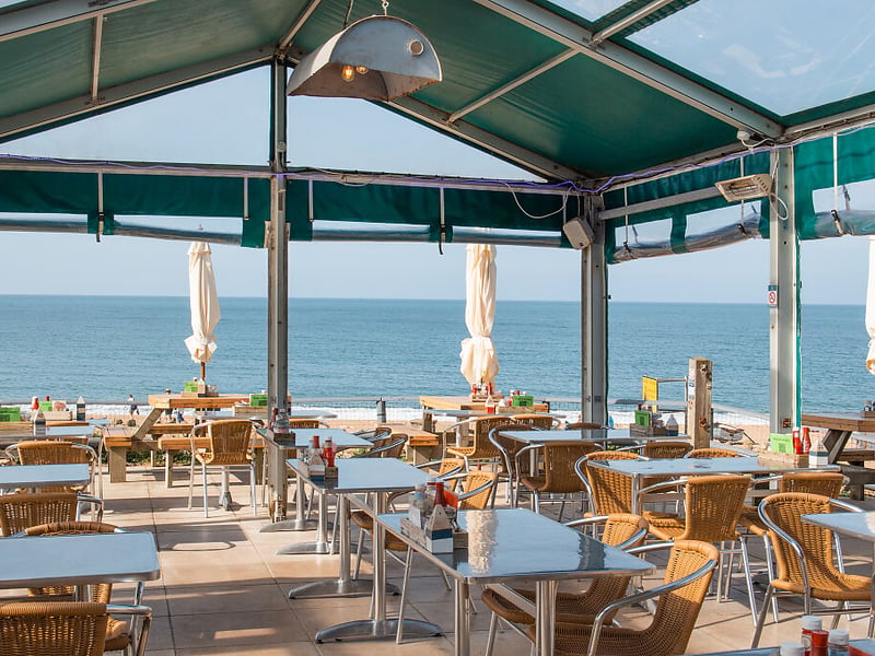 Hive Beach Café is located in Burton Bradstock, Dorset. The Good Food Guide says: “The tightly focused menu eschews starters but has an insistence on what is fresh, flavoursome and fun.”